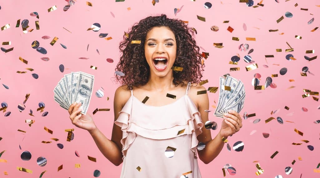 Excited woman with a big smile after winning $10,000.