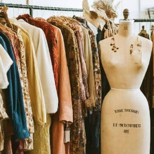 Rack of clothing for sale.