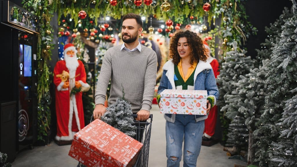Couple shopping for holiday decorations and gifts.