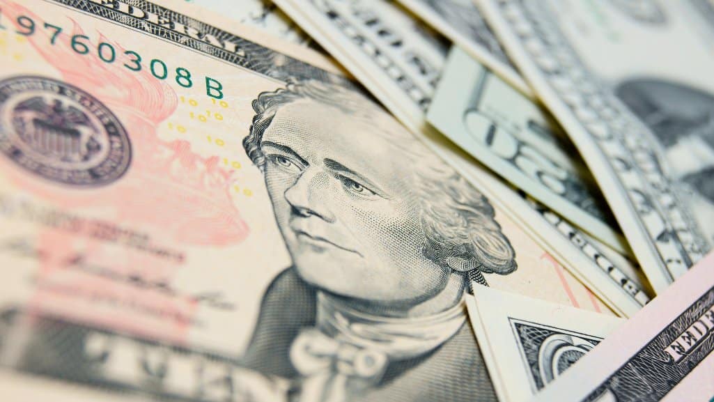 Close up of a US $10 bill.