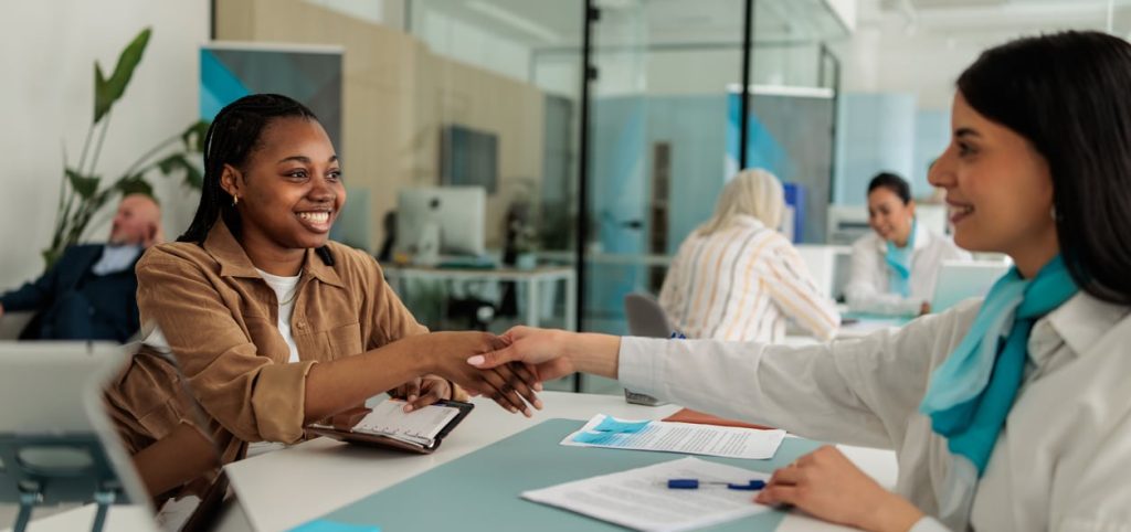 People Driven Credit Union loan officer in Oak Park talking with a member about a personal loan.