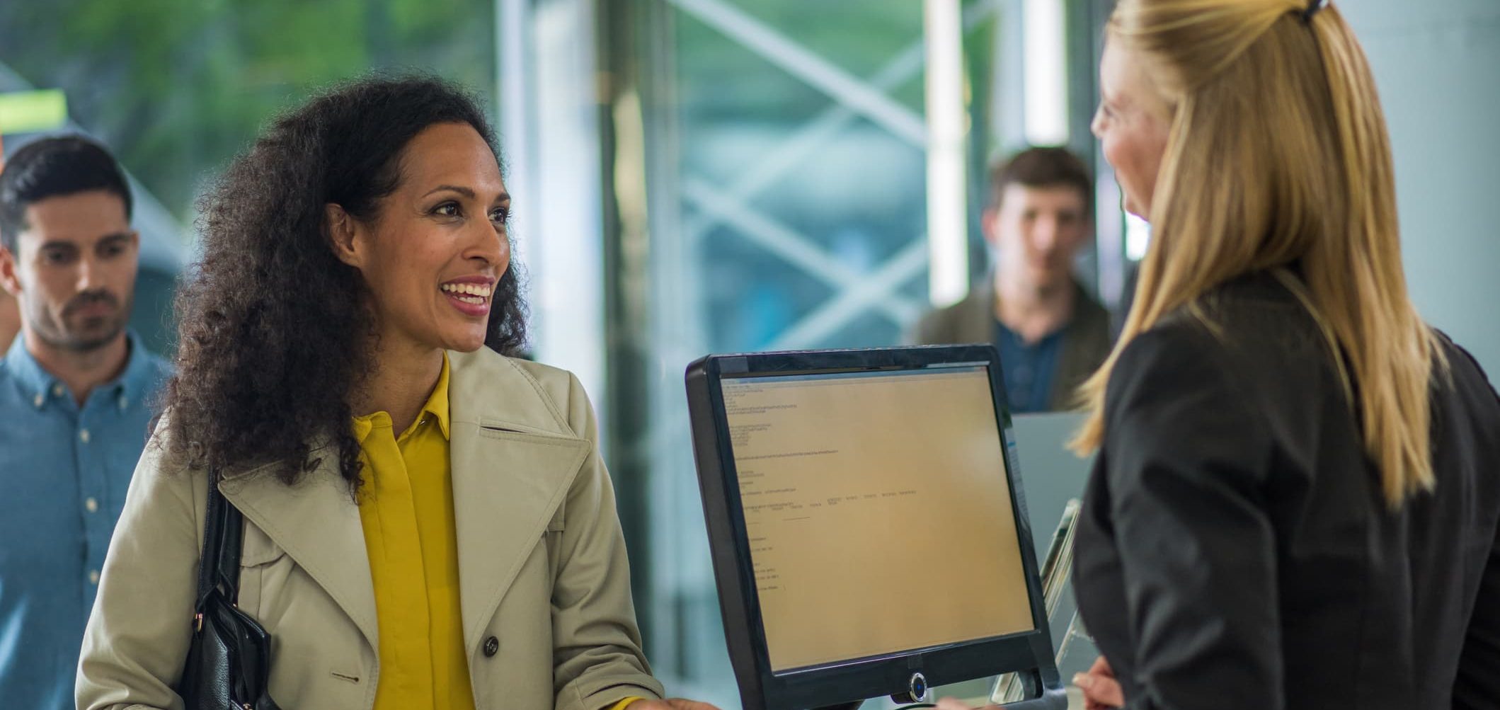 People Driven Credit Union loan officer in Novi talking with a member about a personal loan.