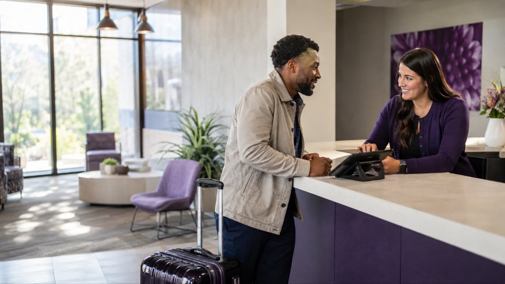 PDCU member receiving help at a credit union shared branch while traveling.